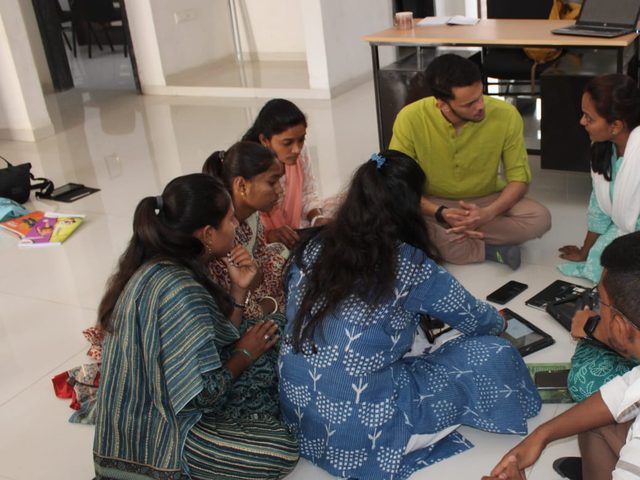 Working through the app with field staff on their tablets