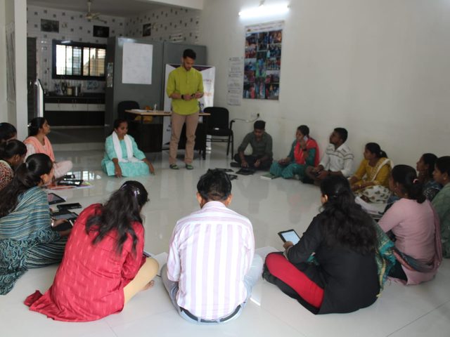 Training a field team, tablets in hand